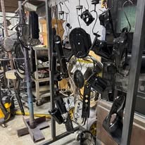 Parts hanging in the powder coating workshop