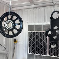 Powder coated wheel hanging in the shop